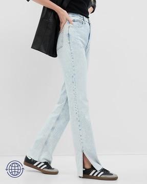 heavy-wash relaxed fit jeans with side slits