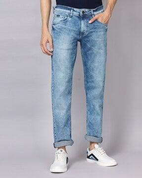 heavy-wash relaxed fit jeans