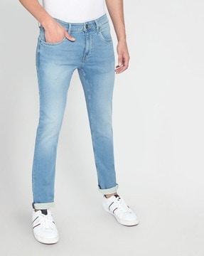 heavy-wash skinny fit mid-rise jeans