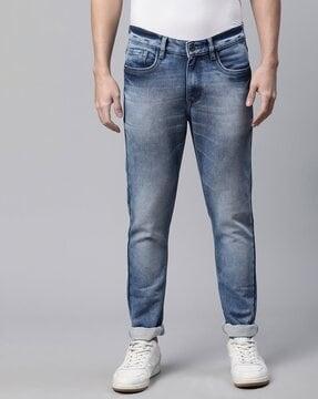 heavy-washed slim fit jeans