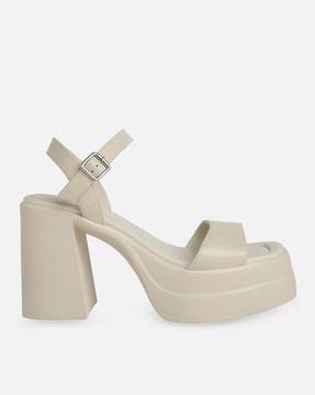 heeled sandals with buckle closure