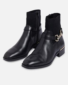 heeled boots with zip closure & metal accent