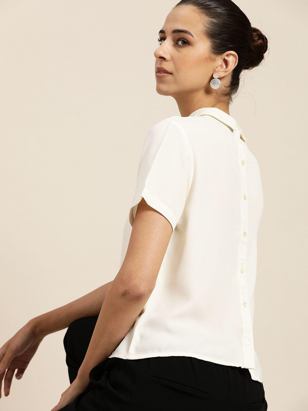 her by invictus off white solid styled back top