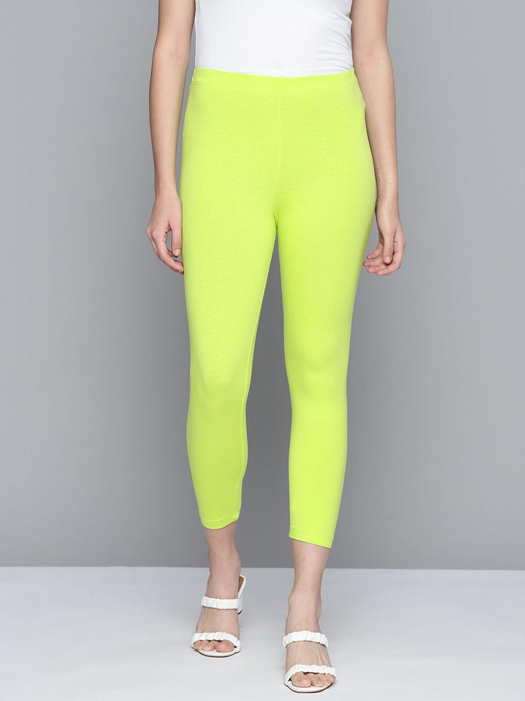 here&now women fluorescent green solid three-fourth length leggings