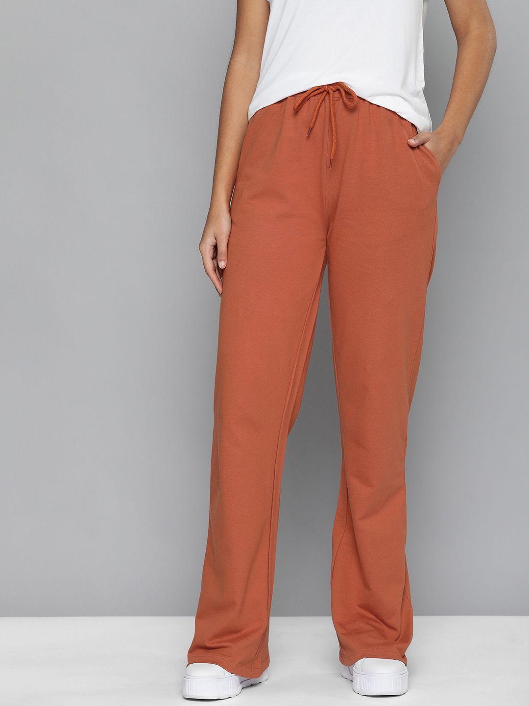 here&now women rust solid regular fit knitted pure cotton track pants