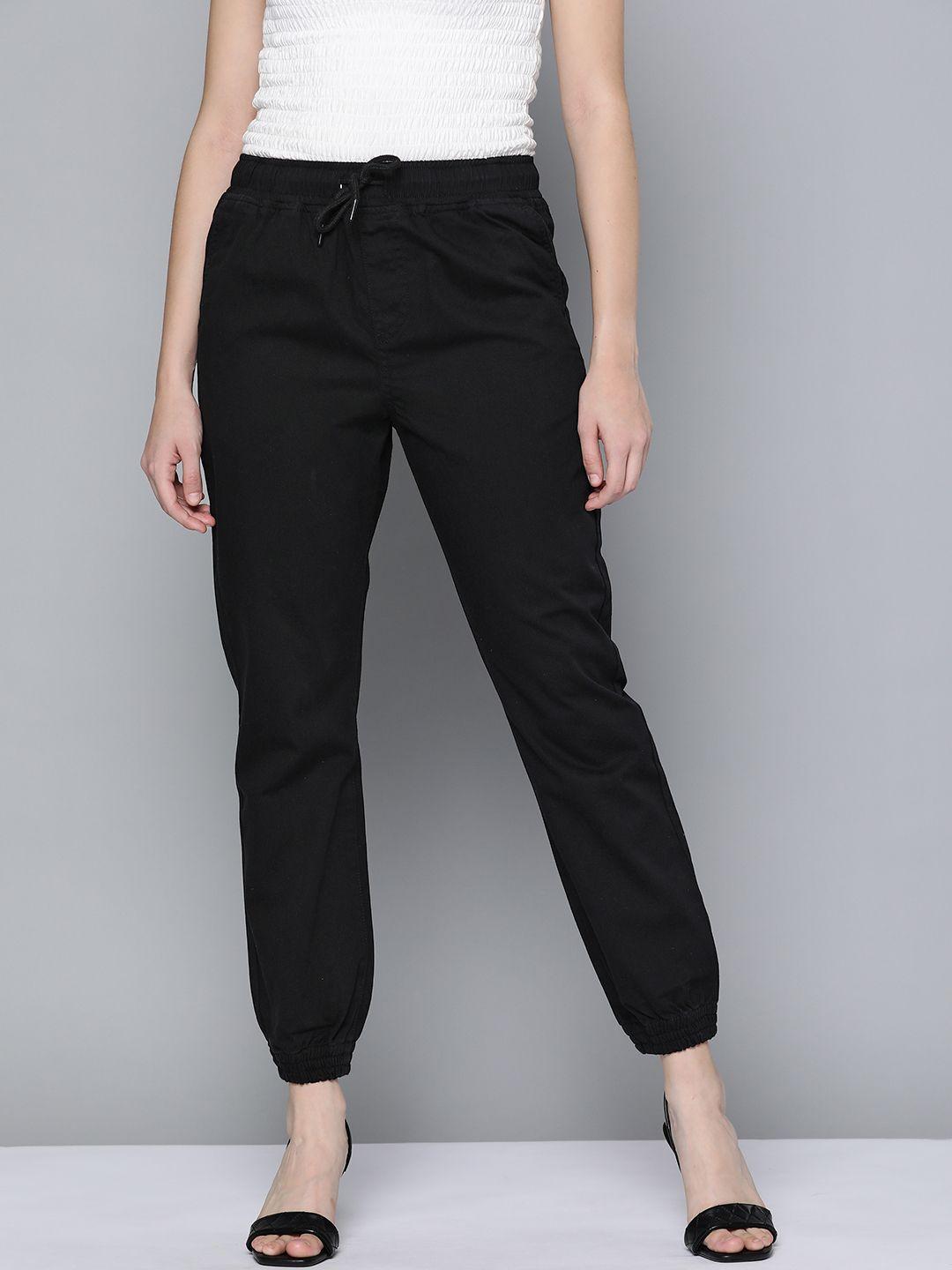 here&now women black solid woven joggers