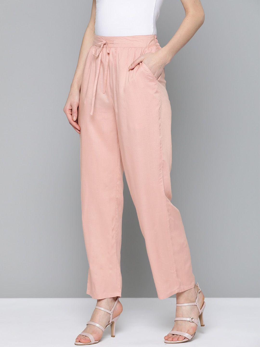 here&now women peach-coloured solid trousers