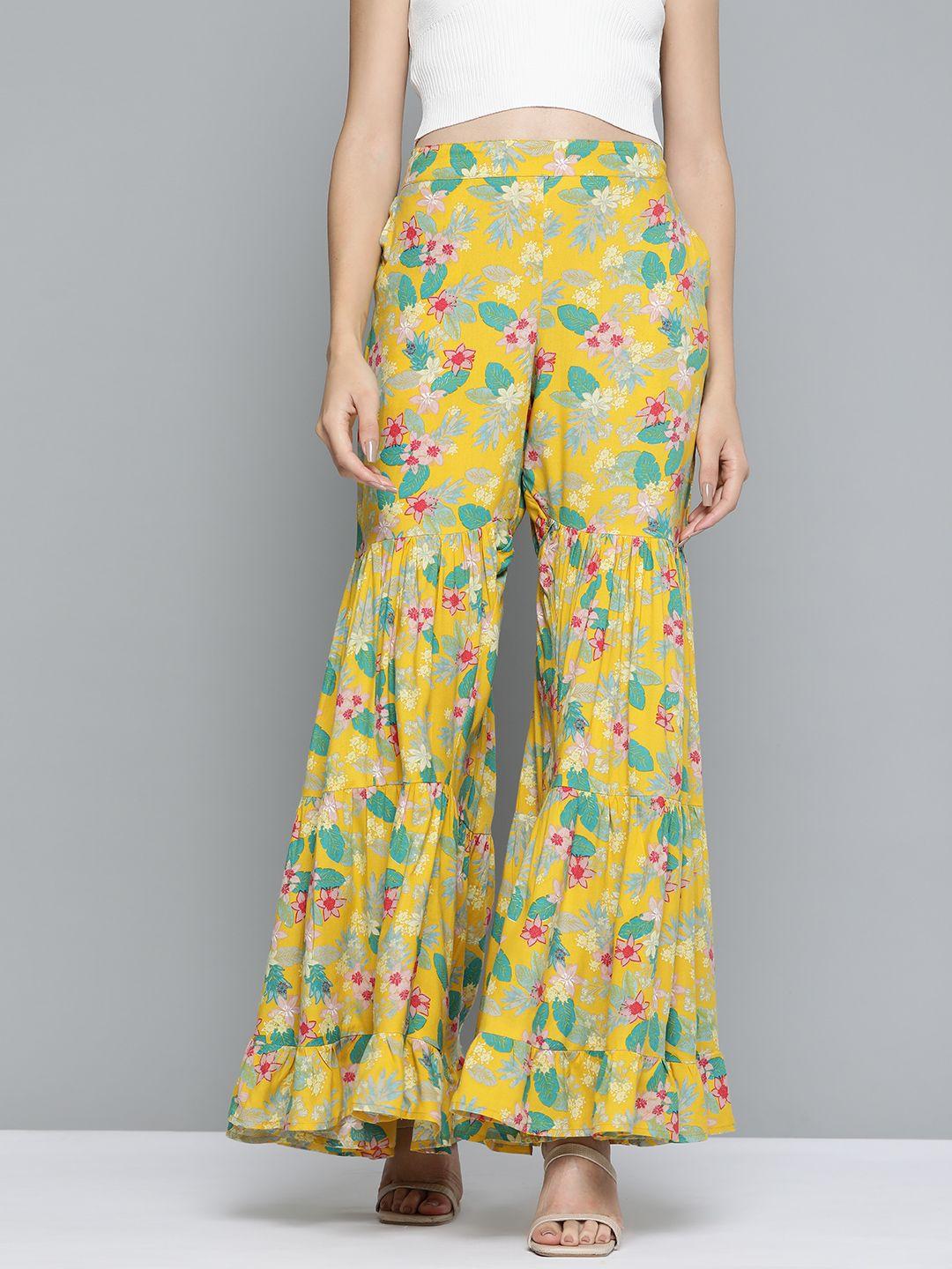 here&now women yellow floral printed flared ethnic palazzos