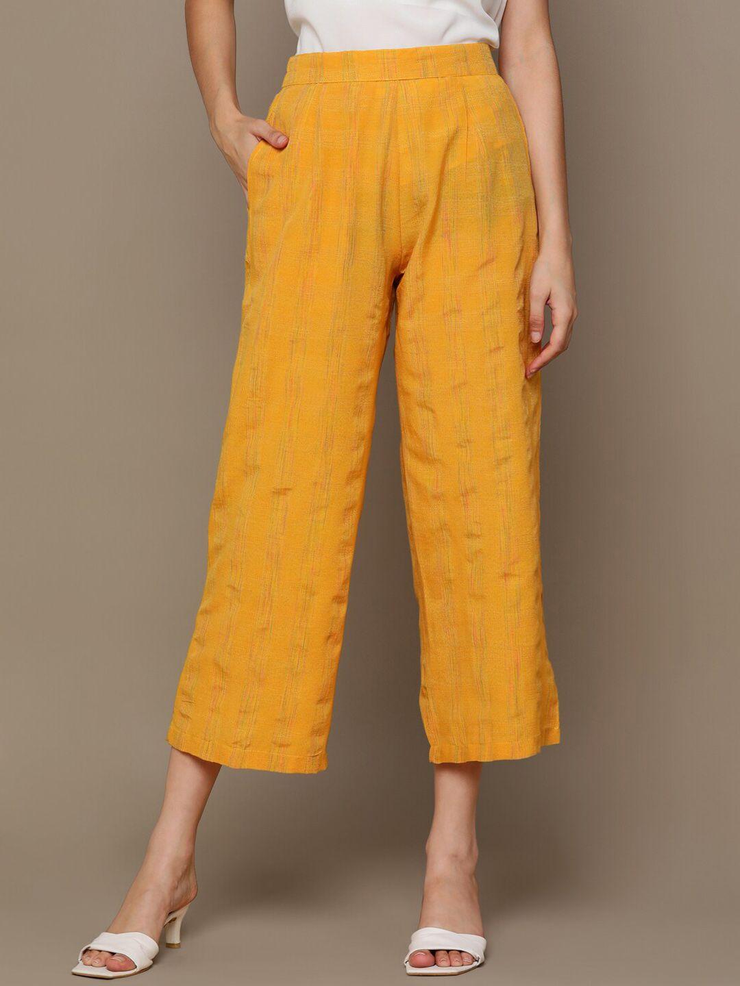here&now women yellow self design cropped parallel trousers