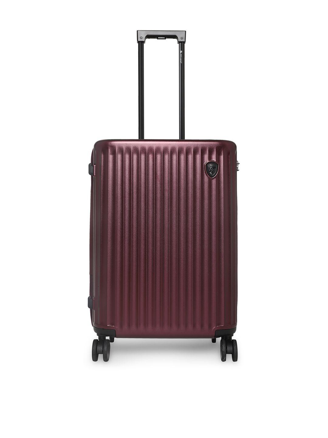 heys burgundy striped hard-sided large trolley suitcase
