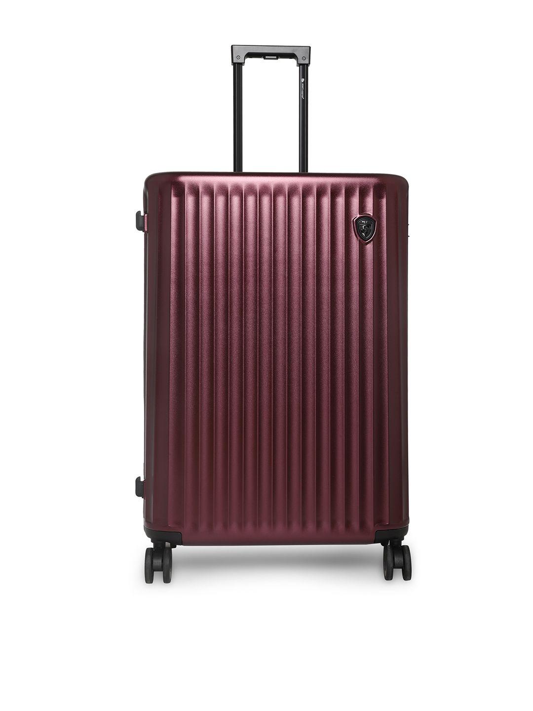 heys burgundy textured hard-sided large trolley suitcase with bluetooth tsa lock