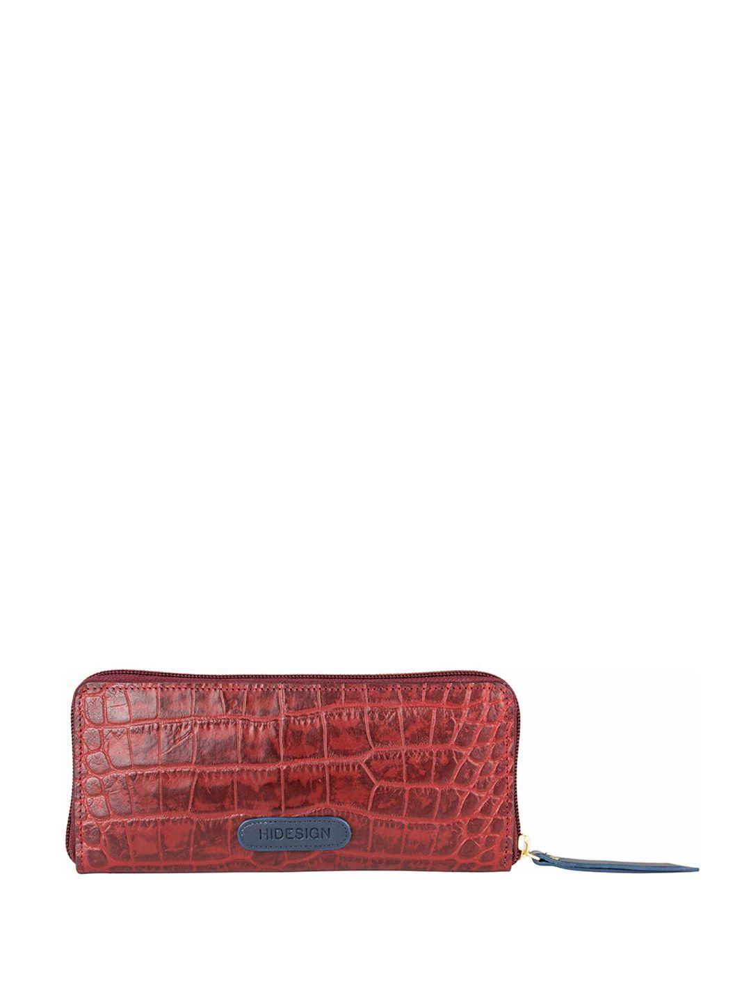 hidesign animal textured purse clutch