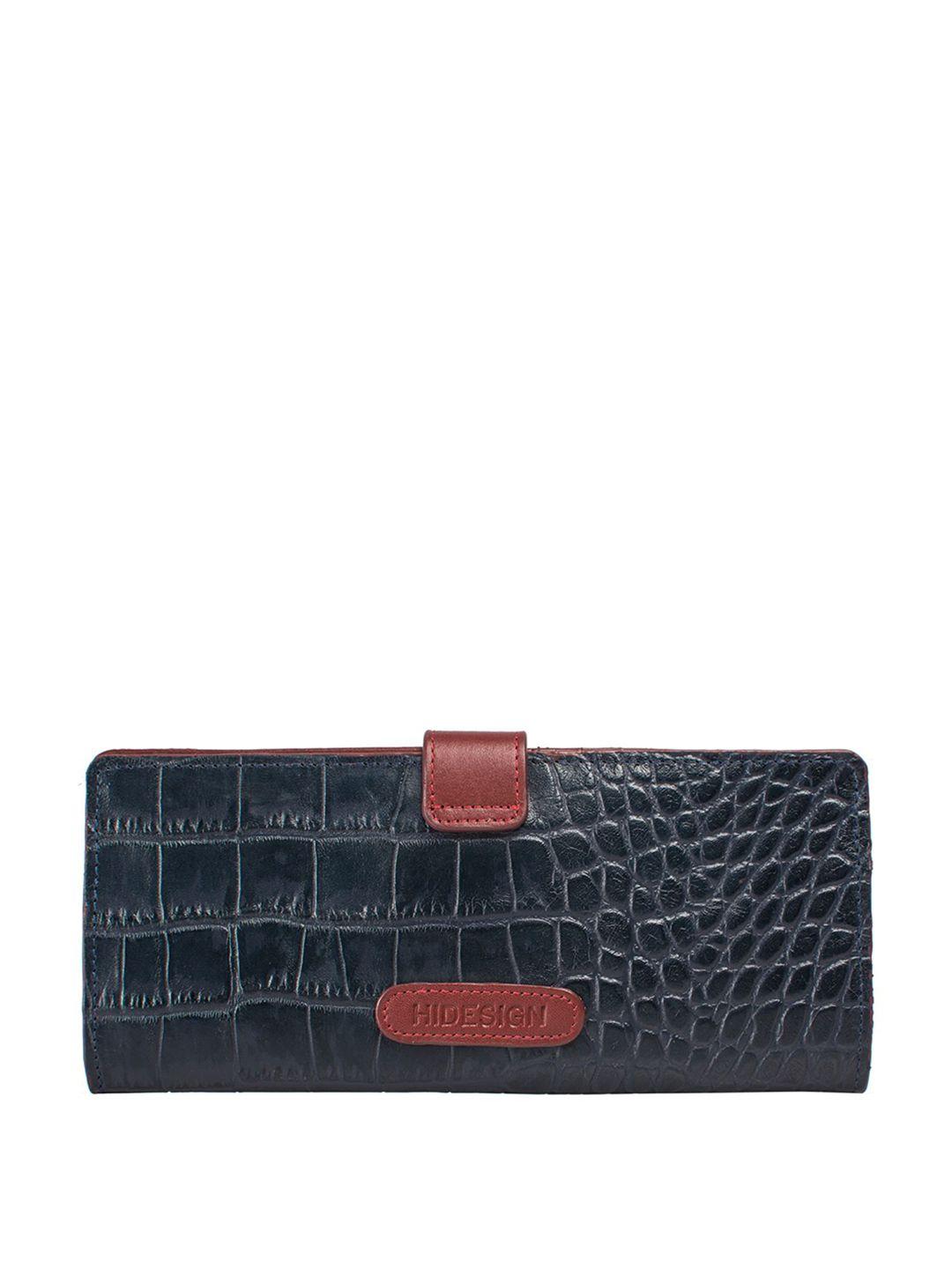 hidesign animal textured purse clutch