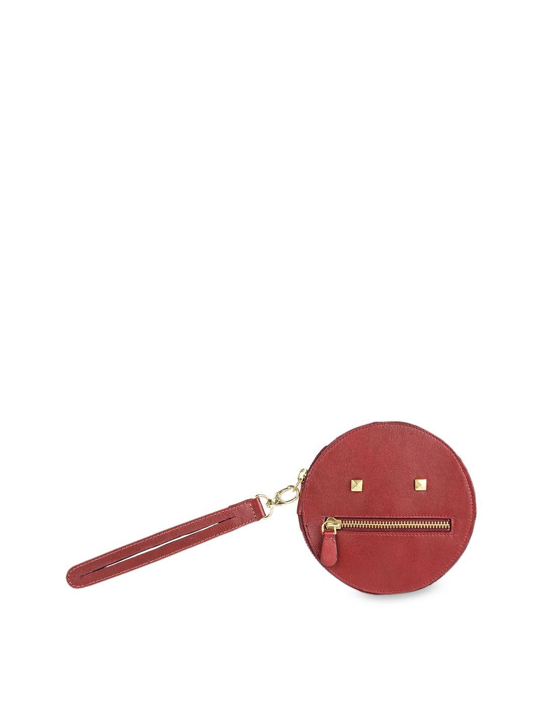 hidesign red circular leather purse clutch