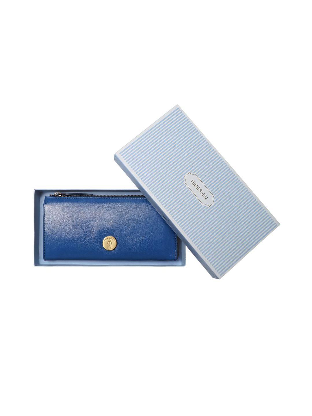hidesign blue purse clutch