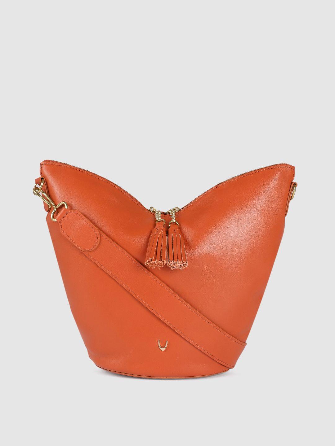 hidesign orange solid leather structured hobo bag with tasselled