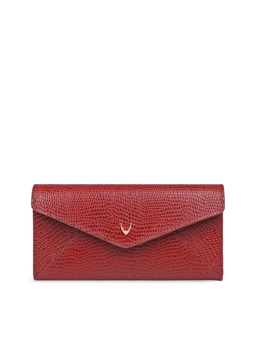 hidesign red textured envelope clutch