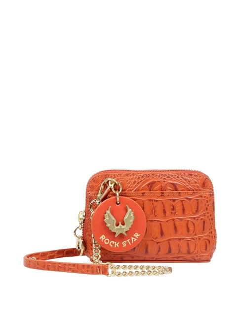 hidesign rockstar punk w2 orange textured small sling handbag