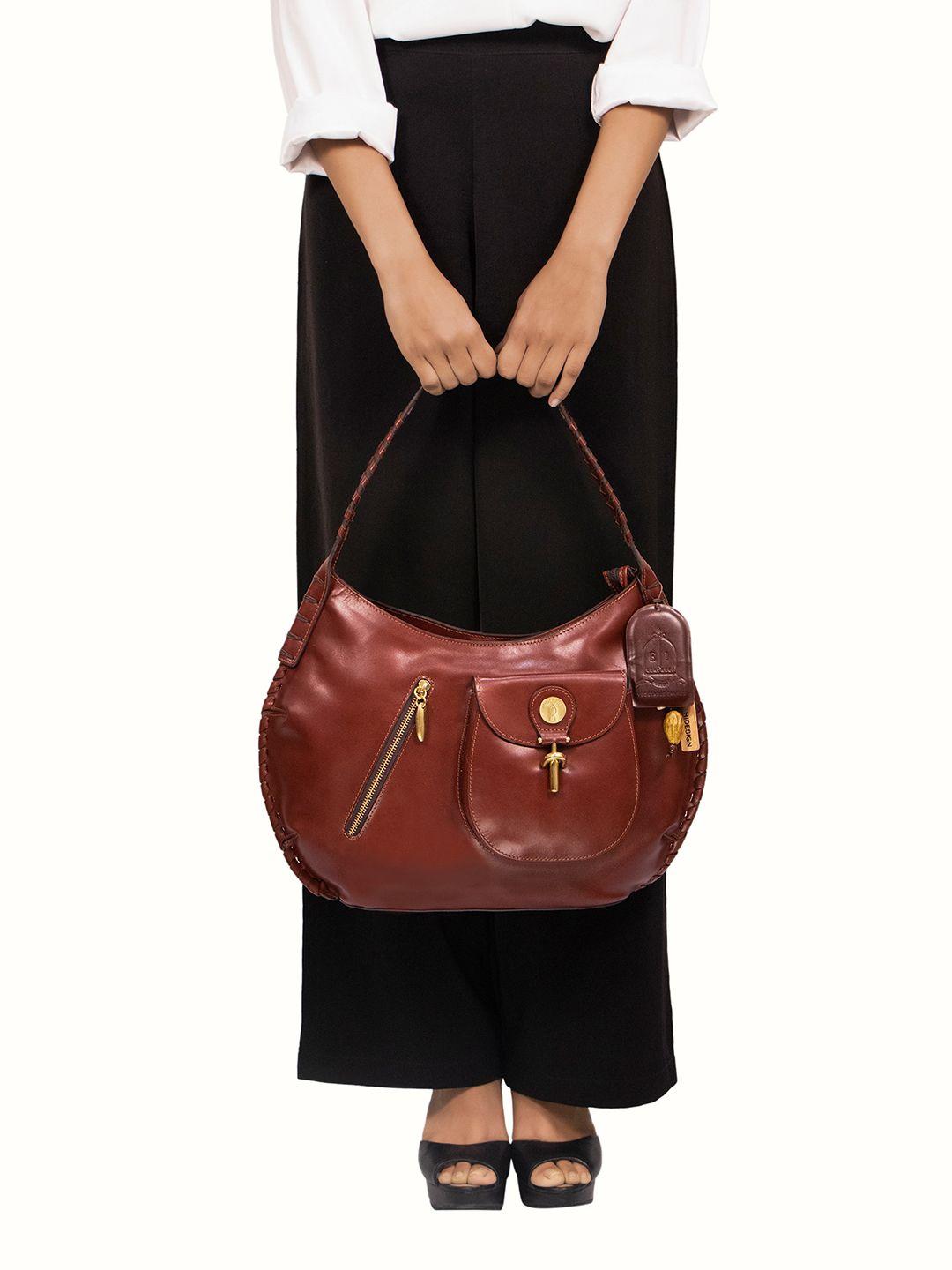 hidesign textured leather structured handheld bag with tasselled