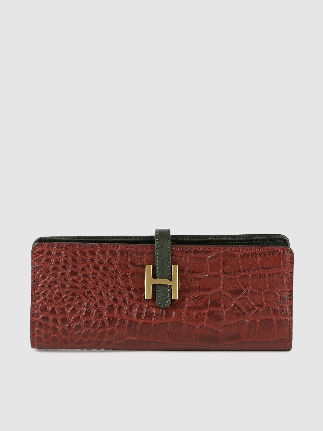 hidesign women rust red textured two fold leather wallet