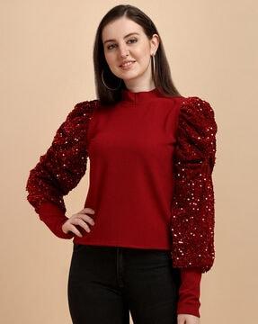 high-neck top with puffed sleeves