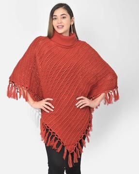 high-neck poncho with tassels