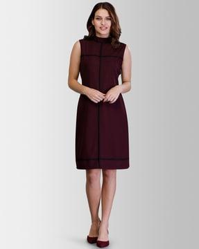 high-neck shift dress with contrast piping