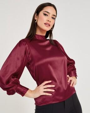 high-neck top with balloon sleeves