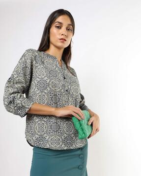 high-neck top with button placket