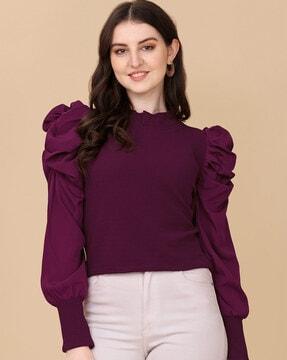 high-neck top with leg-o-mutton sleeves