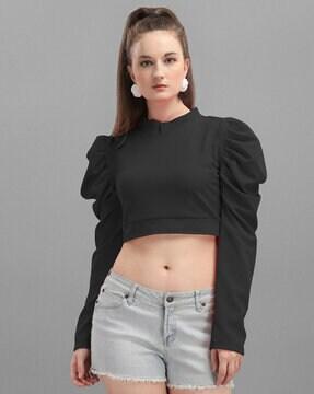 high-neck top with puffed sleeves