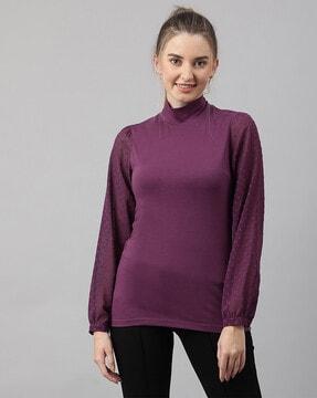 high neck top with swiss-dotted sleeves