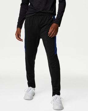 high-rise joggers with contrast stripes