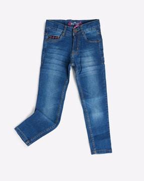 high-rise mid-wash cotton jeans