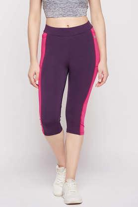 high-rise active capri in violet with side pockets - purple