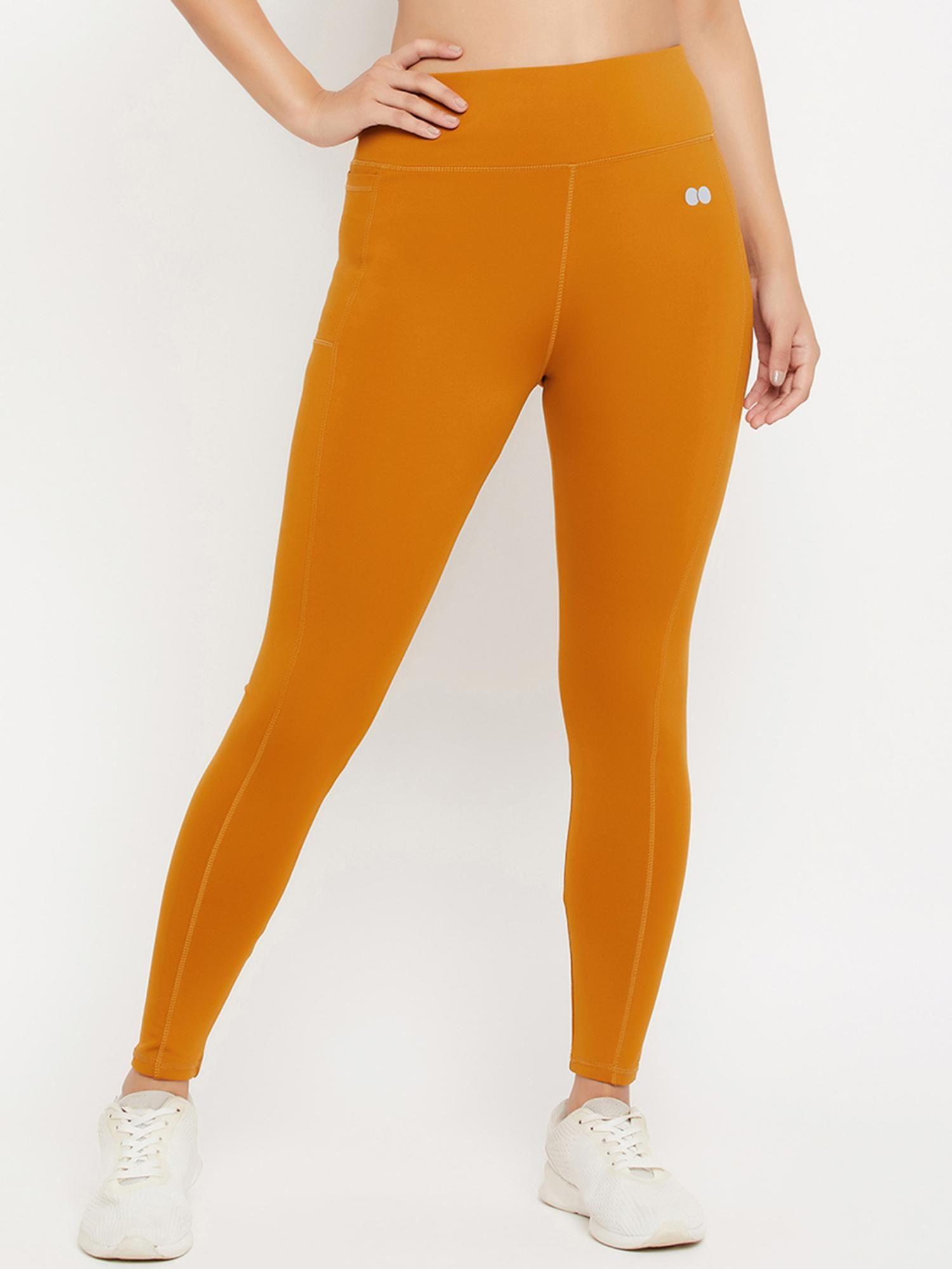 high rise active tights in mustard yellow with side pocket