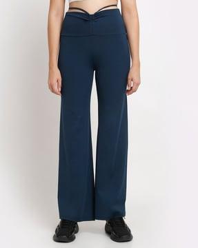 high-rise flared flat-front trousers
