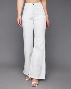 high-rise flared jeans with frayed hem