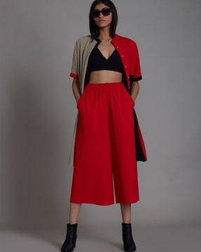 high-rise flared pants with elasticated waist