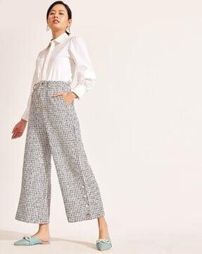 high-rise flared pants with insert pockets