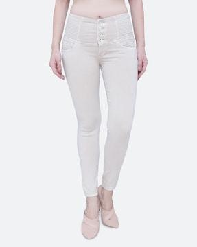 high-rise jeans with embroidered waistband