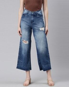 high-rise lightly distressed denim jeans