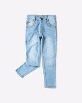high-rise mid washed jeans