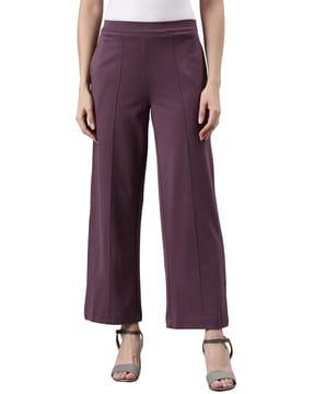 high-rise pants with elasticated waistband