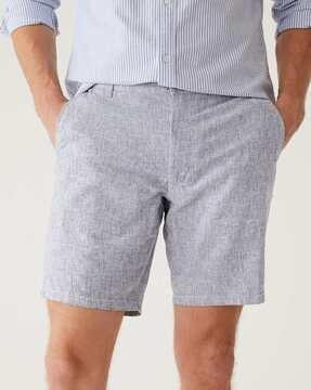 high-rise shorts with insert pockets