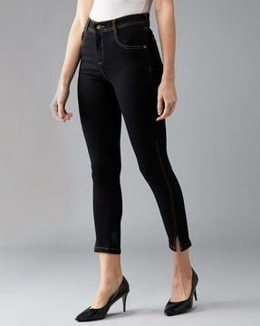 high-rise skinny jeans with slits