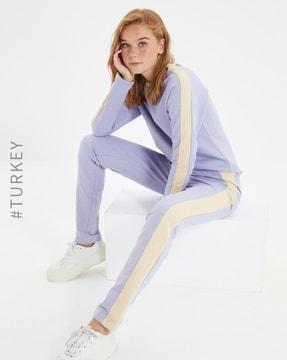 high-rise track pants with contrast side panels