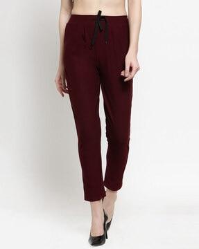 high-rise trousers with tie-up