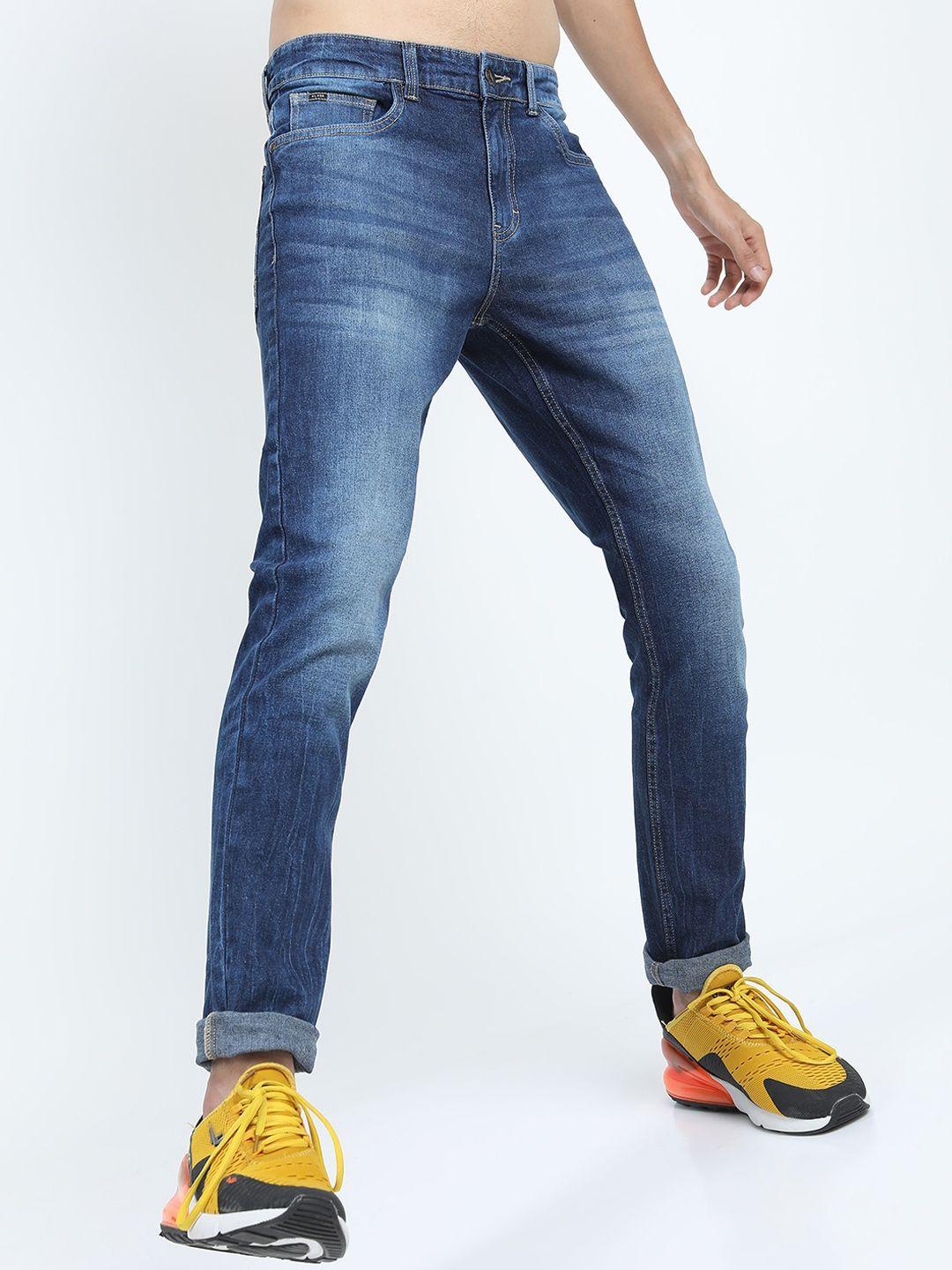 highlander men blue slim fit mildly distressed light fade stretchable jeans