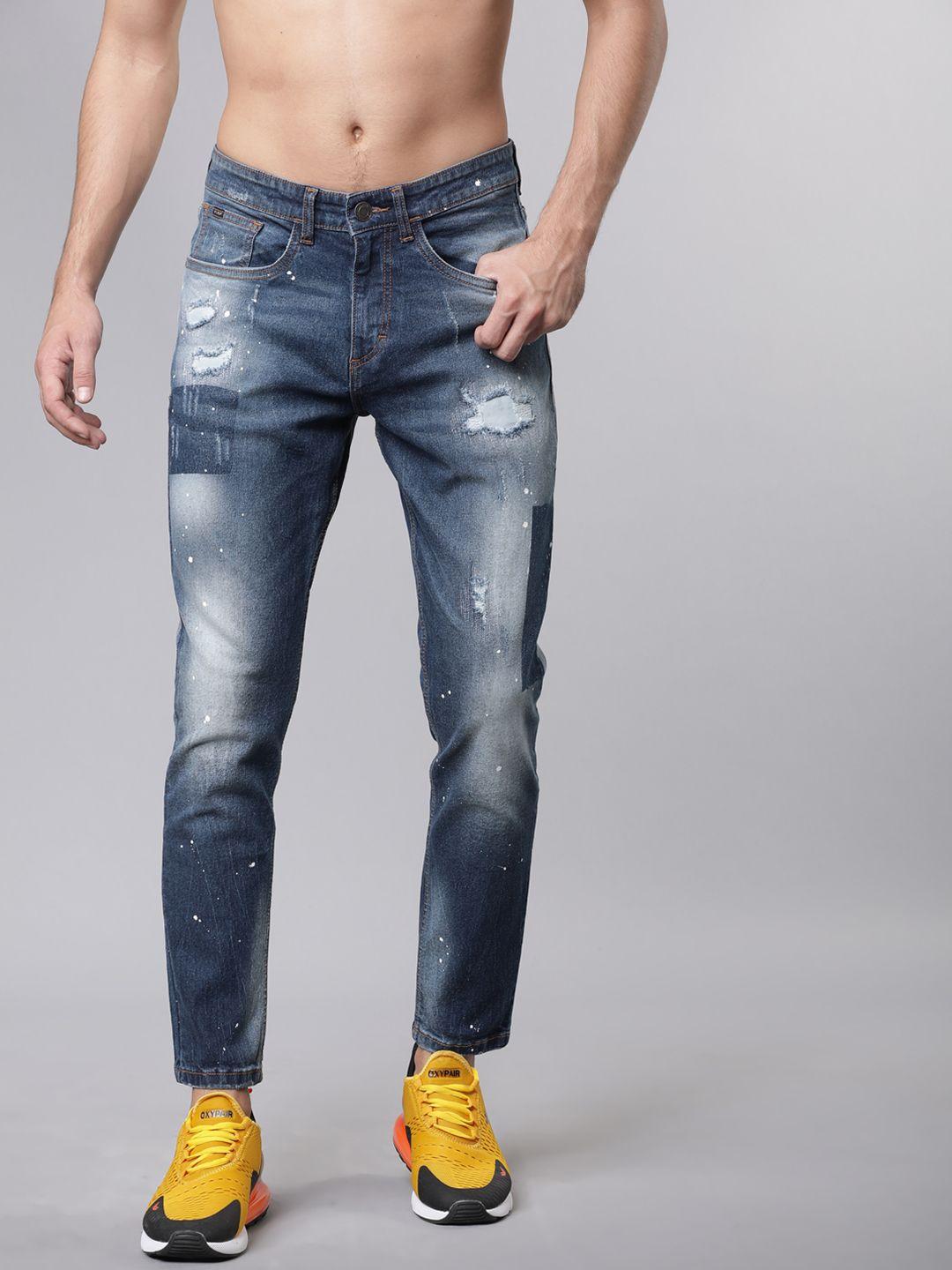 highlander men blue tapered fit mid-rise mildly distressed stretchable jeans